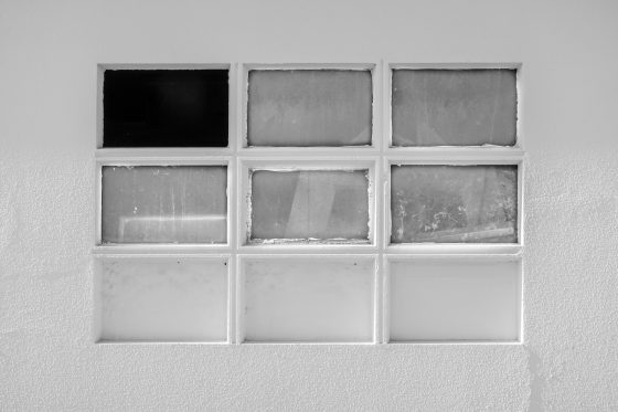 nine glass windows, from black to white