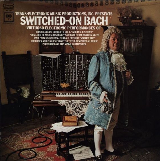 J. S. Bach in front of a Moog synthesizer